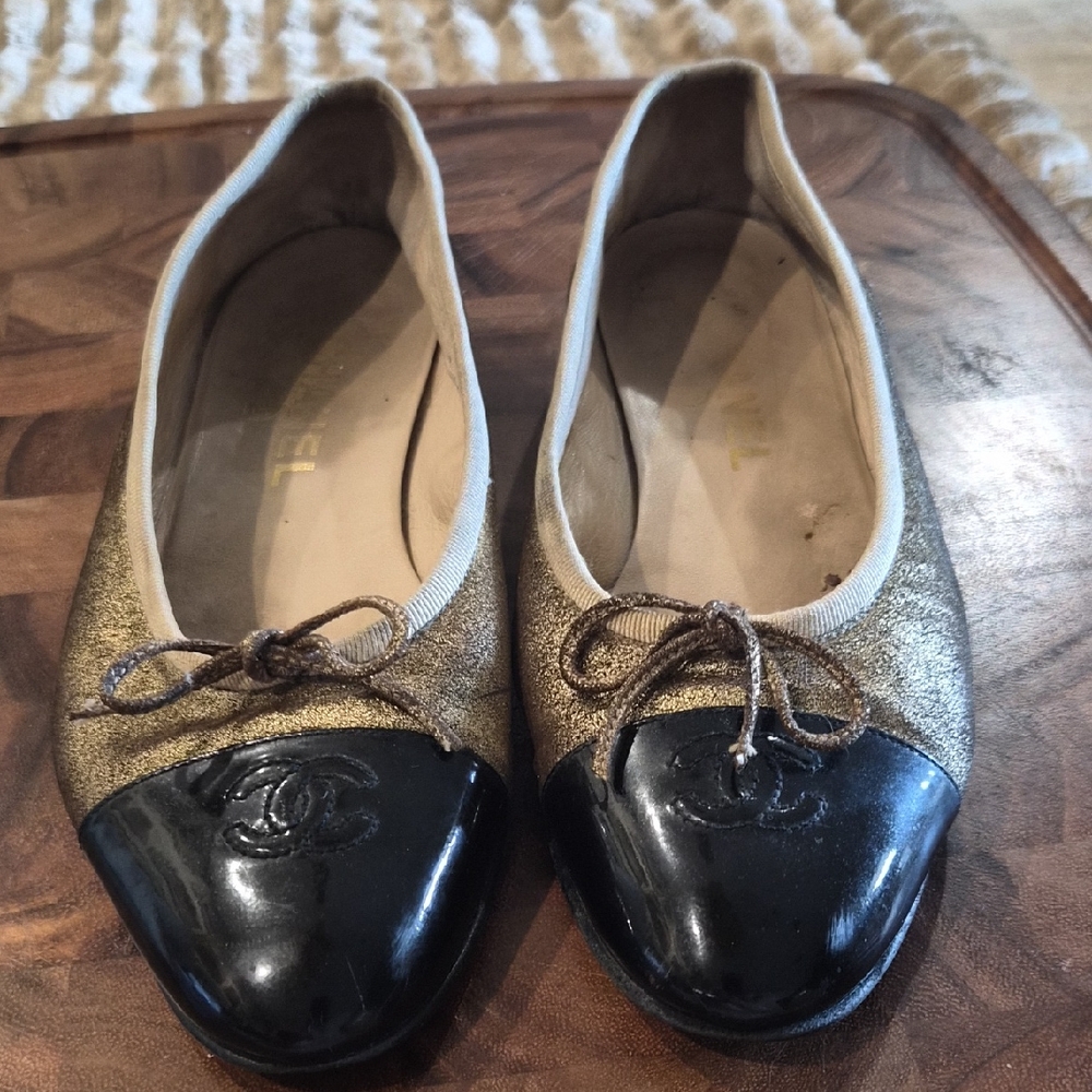 CHANEL Gold and Black Cap-Toe Ballet Flats with Logo